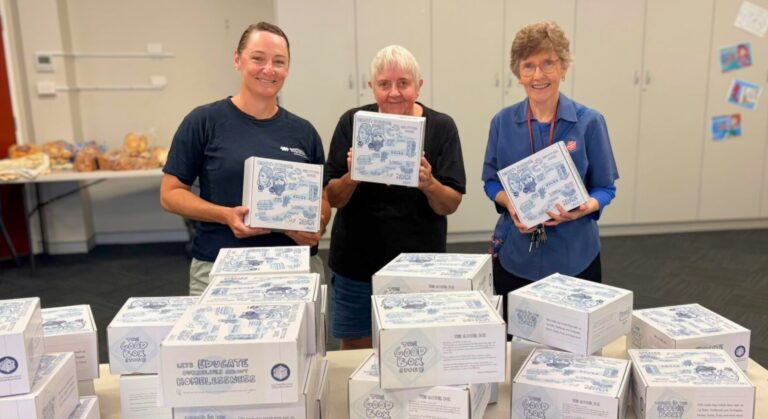 Beyond the Boardroom staff donating the Good Box with the Salvation Army